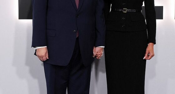 The First Lady donned a buttoned black dress and stilettos as she was joined by her husband who wore his signature navy blue suit