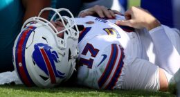 Josh Allen #17 of the Buffalo Bills reacts after an injury during the second quarter against the Jacksonville Jaguars in the AFC Wild Card Playoff game at EverBank Stadium on Sunday