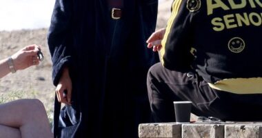 Kaia Gerber seemed to be living her best life as she was spotted happily puffing on what looked like a cigarette between takes of her new Ryan Murphy drama