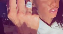 Katie Price has flashed her huge engagement ring as she kissed her new fiancé Lee Andrews after he popped the question whilst they holiday in Dubai
