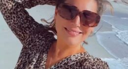 Kelly Brook was making the most of her time in Cape Town this weekend as she enjoyed a boozy dance at a lunch spot before strolling along a picturesque beach