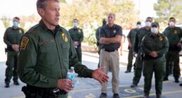 A new report cites eight sources claiming that DHS Secretary Kristi Noem and her ally Corey Lewandowski deployed tactics trying to force CBP Commissioner Rodney Scott (pictured) to resign