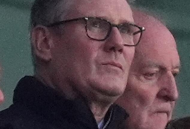 Keir Starmer, pictured at the Arsenal match on Sunday, was warned last night that the by-election block on Andy Burnham has made it more likely he will face a leadership challenge