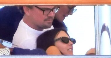 Leonardo DiCaprio and his much-younger girlfriend Vittoria Ceretti looked cozy as they cuddled on board Jeff Bezos' mega boat, with her head resting near his lap