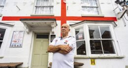 Jerry Kunkler, the landlord of Moonrakers Inn in Pewsey, Wiltshire, since 1981, painted the England flag on his pub in 2016