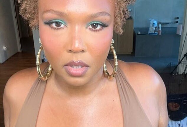Lizzo looked glowing as she showed off her stunning transformation in striking before and after clips on social media on Friday