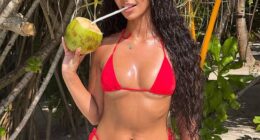 Sophie Piper showed off her incredible curves in a barely-there red bikini as she enjoyed a romantic holiday to the Maldives with boyfriend Josh Ritchie