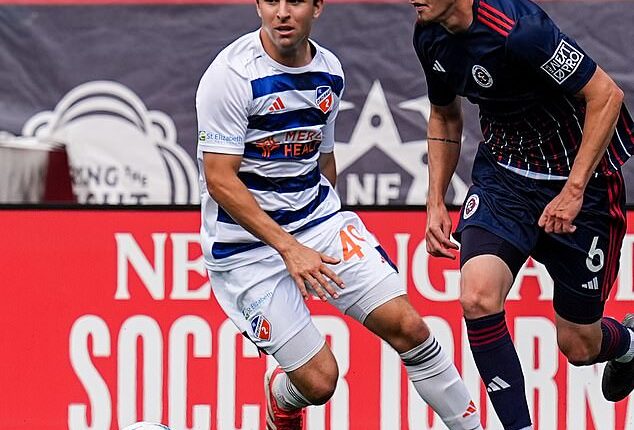 Brooklyn FC has signed midfielder Peter Mangione (white kit) to their roster