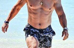 Mark Wahlberg and Rhea Durham flaunted their swimsuit bodies as they soaked up the sun on their New Year's trip to Barbados this week