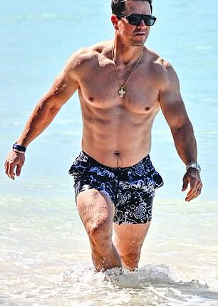 Mark Wahlberg and Rhea Durham flaunted their swimsuit bodies as they soaked up the sun on their New Year's trip to Barbados this week