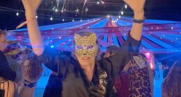 Mick Jagger, 82, puts on an animated display in animal mask as he rings in the New Year at outdoor party