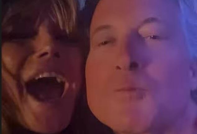 Heidi Klum, 52, filmed herself dancing with a pouting middle-aged reveler during a New Year's Eve party in St Barts