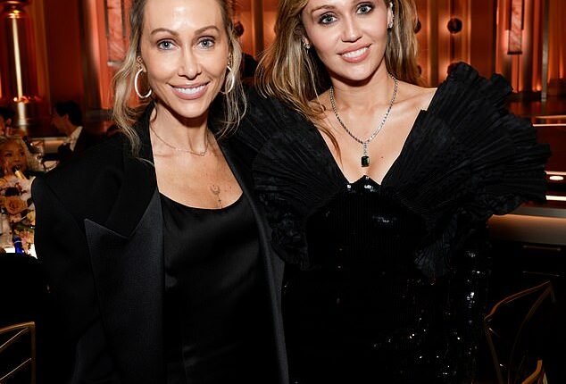 Tish Cyrus opened up about turning to marijuana to help her get through her brutal split from her husband Billy Ray Cyrus in a new podcast appearance; pictured with daughter Miley at the Golden Globe Awards in Beverly Hills on Sunday