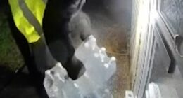 Moment delivery man removes water bottles from doorstep of Kent home that's been left without supply for more than a week