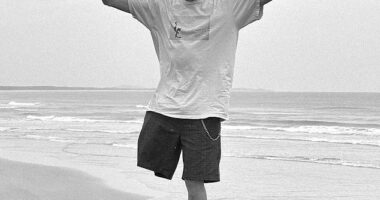 Recalling the attack, Kai McKenzie (pictured) said he repeatedly trying to kick the shark away before finally catching a wave to shore where a former police officer raced to help him