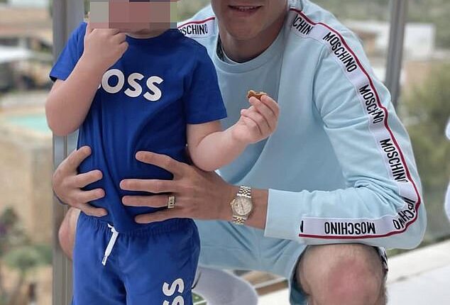 Blue Stevens with his son. He was stabbed outside the £1,650-a-night 5-star Park Tower Hotel and Casino, which is directly across the road from the Harvey Nichols department store in central London, on July 9