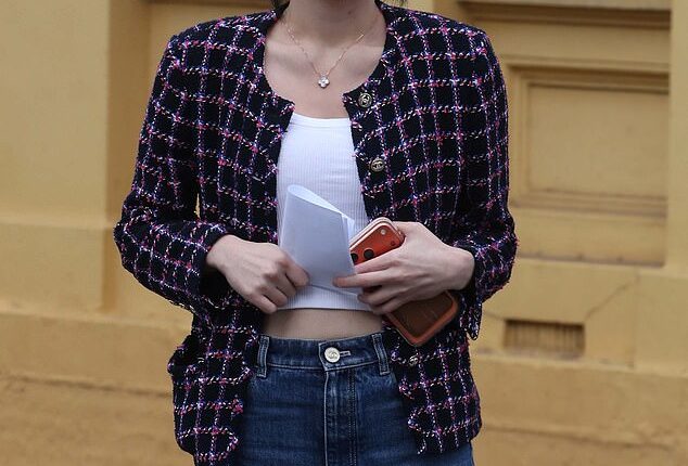 Mysterious Chinese heiress LanLan Yang, who allegedly crashed her $1.5million Rolls-Royce into a chauffeur-driven Mercedes-Benz, has been charged with breaching her bail. The woman pictured above reported for bail as Yang last Friday then claimed she was 'someone else'