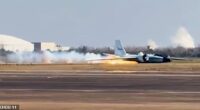 Footage captured the moment the plane skidded across the runway, leaving a trail of flames behind