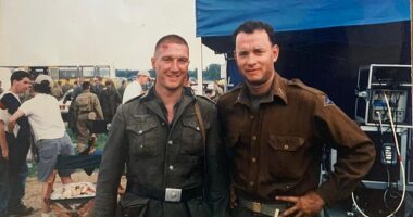 Tom Hanks, right, posing for a photo with Mike on his last day of filming