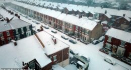 Snow covered rooftops in Whitley Bay this morning as weather warnings remain in effect across large parts of the UK