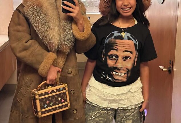 Kim Kardashian's tween daughter North West has seemingly revealed more finger piercings despite growing fan over the 'risky' procedure