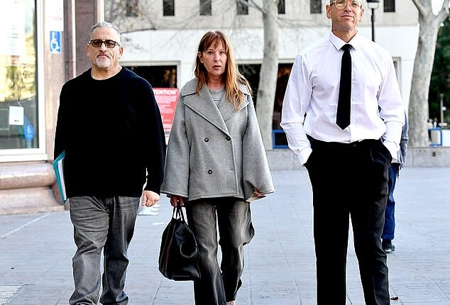 Noughties heart-throb Didier Cohen (pictured right, outside Van Nuys Courthouse on Wednesday with his mother, centre) is fighting to stay out of an American prison after being accused of breaking into his father's Malibu home and assaulting him and his live-in girlfriend