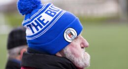 A fan enjoys the only Lowland League game to survive the frost, between Bo'ness United and East Stirlingshire