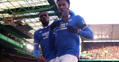 Youssef Chermiti celebrates with Dujon Sterling after hauling Rangers level at Celtic Park