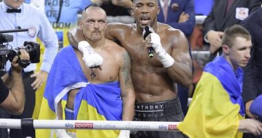 Anthony Joshua (right) pictured with Oleksandr Usyk (left) after their 2022 rematch that the Ukrainian won. Usyk believes AJ will keep fighting after the death of his friends