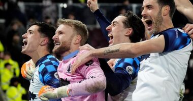 Falkirk players celebrate a shoot-out victory over Hearts at Tynecastle