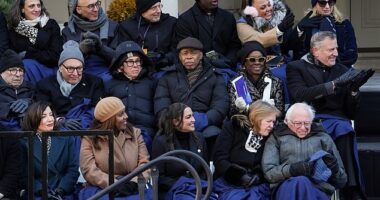 Iris Weinshall, third from left in middle row, was unable to hide her apparent distaste as Zohran Mamdani was sworn in as the new Mayor of New York City on Thursday. Her husband, Senator Chuck Schumer sits to her right, while former Mayor Eric Adams looked equally unimpressed to her left