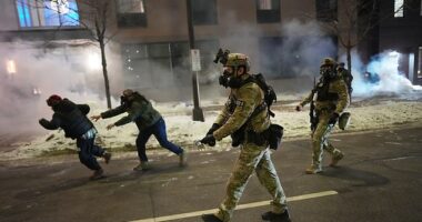 Authorities cleared out the crowd of protestors in front of the hotel on Sunday night