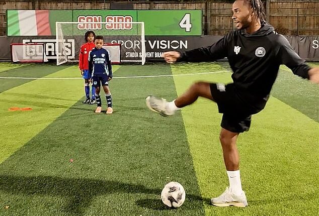 Raheem Sterling, seen coaching youngsters, has been exiled at Chelsea and is set to leave