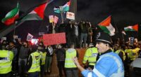 Pro-Palestinian protesters gather outside the stadium as Maccabi Tel Aviv fans were barred from travelling to the game at Villa Park in November by the local Safety Advisory Group (SAG), which cited safety concerns based on advice from the police force
