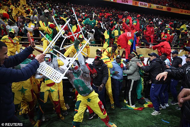 Senegal fans clashed with riot police as the match paused for a staggering 17 minutes and punishments have now been dished out by CAF