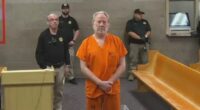 Actor Timothy Busfield appeared somber-faced as he appeared in court before a New Mexico judge on child sex abuse charges on Wednesday afternoon, as shown above