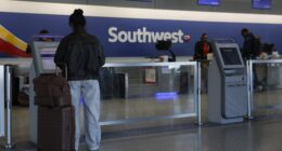 Southwest says assigned seats will make it more profitable this year, as stock rallies