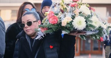 Families gathered and laid tributes at the scene where 40 people were killed following the fire at Le Constellation bar in Crans-Montana, Switzerland