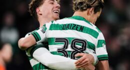 Arne Engels is all smiles as he gives fellow Celtic goalscorer Daizen Maeda a lift at Parkhead
