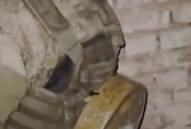 Online footage shows Francis with the landmine strapped to him