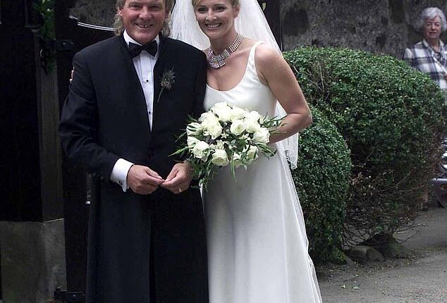Terry Yorath with his daughter Gabby on her wedding day at Logie Kirk in Scotland in July 2001