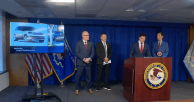DOJ press conference discussing prosecution of alleged fraud