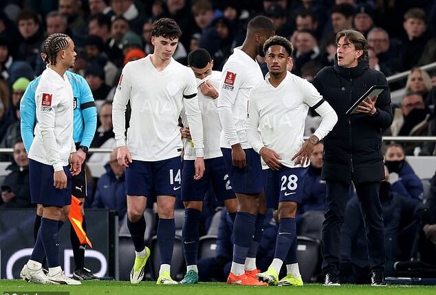 Thomas Frank (right) watched his Tottenham side get dumped out of the FA Cup by Aston Villa