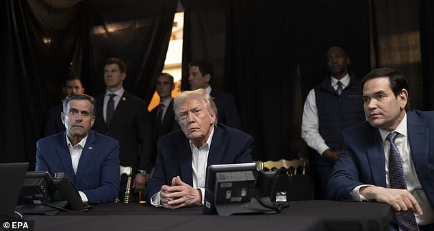 Donald Trump, sitting in between CIA Director John Ratcliffe (left) and Secretary of State Marco Rubio, watches footage of the capture of Nicolas Maduro at Mar-a-Lago on January 3