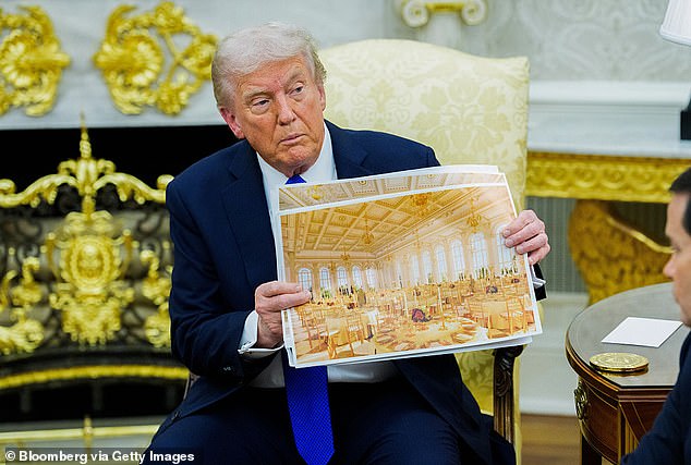 President Donald Trump holds up images of his proposed White House ballroom. Friday morning in Florida he was shopping for marble and onyx at his own expense, the White House said