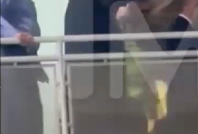 Trump flipped off a heckler accusing him of protecting pedophiles during a Tuesday visit to a Ford factory