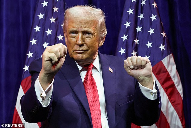 President Donald Trump gestures as he addresses House Republicans at their annual issues conference retreat, at the Kennedy Center, renamed the Trump-Kennedy Center by the Trump-appointed board of directors, in Washington, DC, on Tuesday