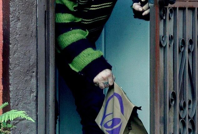 Mickey Rourke, 73, left fans shocked by his appearance as he emerged in Los Angeles looking unrecognizable on Thursday, with a source sharing it 'feels like a miracle he is still alive'