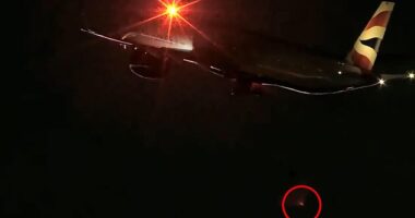 A British Airways plane lost a wheel during takeoff in Las Vegas on Monday night. Picture shows the moment the tyre dropped off the plane's landing gear