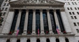 U.S. stock futures dip ahead of a busy week on Wall Street